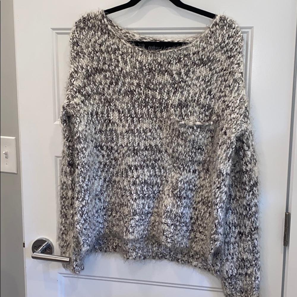 Women’s black and white soft sweater size Small